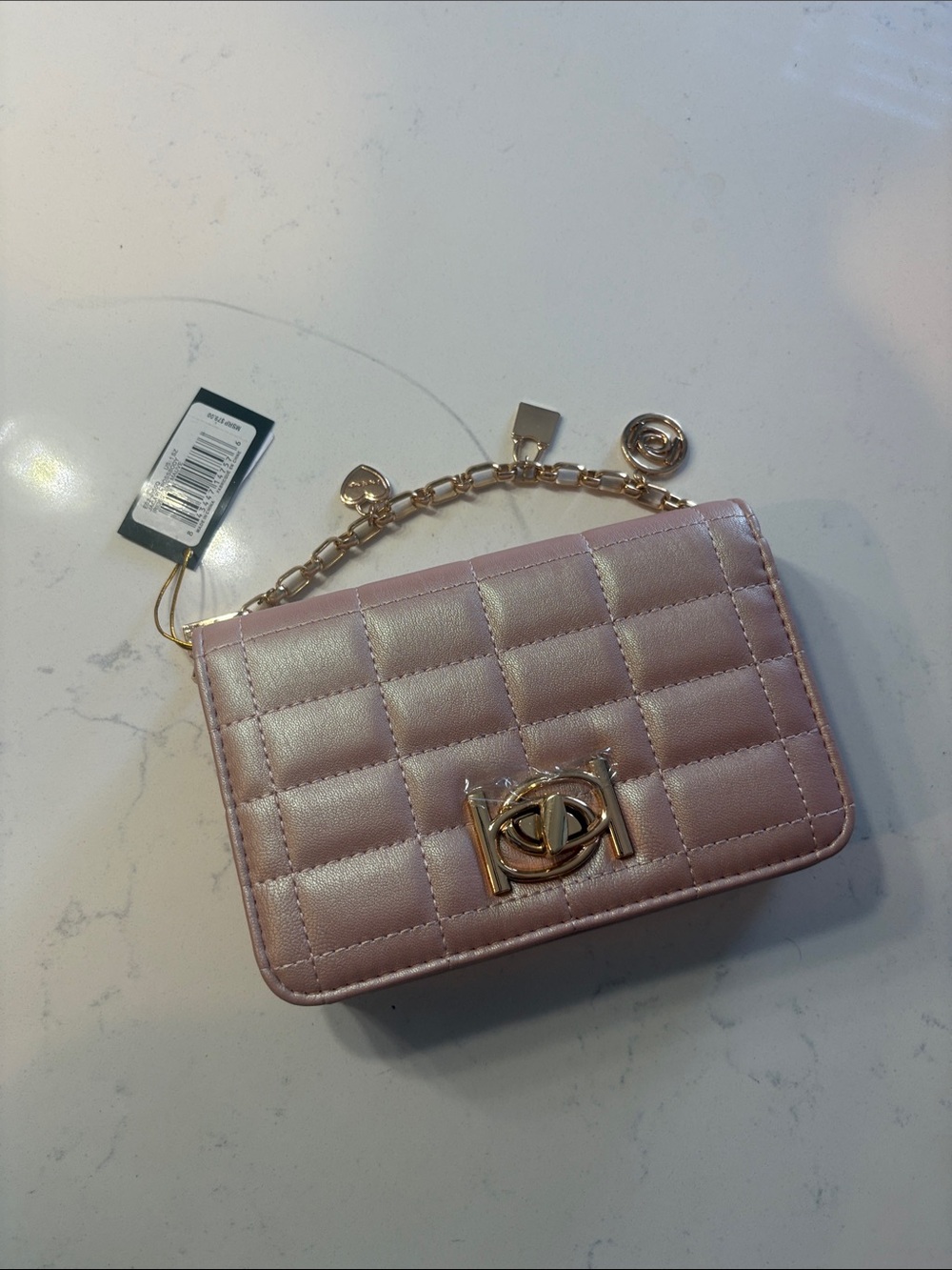 bebe Quilted Light Pink Mini Chain Shoulder Bag with Gold Hardware Accent